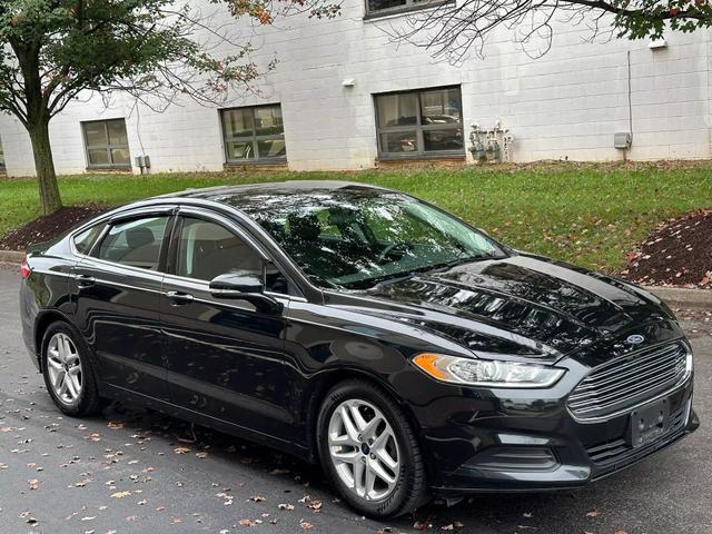 used 2015 Ford Fusion car, priced at $10,878