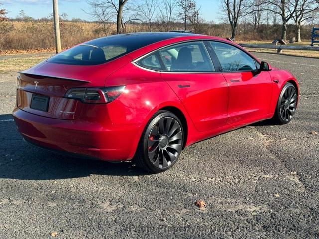 used 2022 Tesla Model 3 car, priced at $25,991