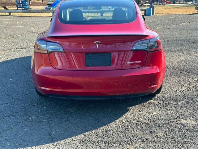 used 2022 Tesla Model 3 car, priced at $25,991