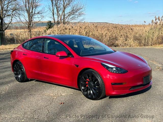 used 2022 Tesla Model 3 car, priced at $25,991