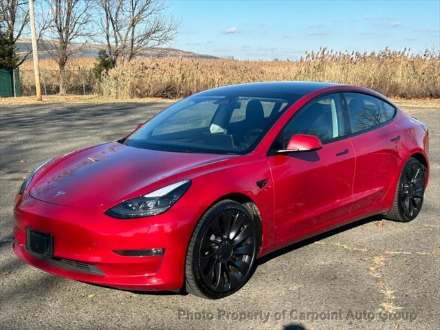 used 2022 Tesla Model 3 car, priced at $25,991