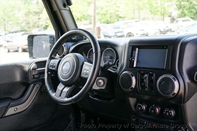 used 2011 Jeep Wrangler Unlimited car, priced at $10,994