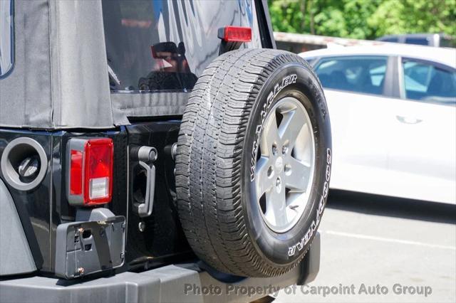 used 2011 Jeep Wrangler Unlimited car, priced at $10,994