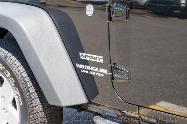 used 2011 Jeep Wrangler Unlimited car, priced at $10,994