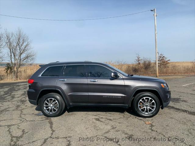 used 2014 Jeep Grand Cherokee car, priced at $9,991