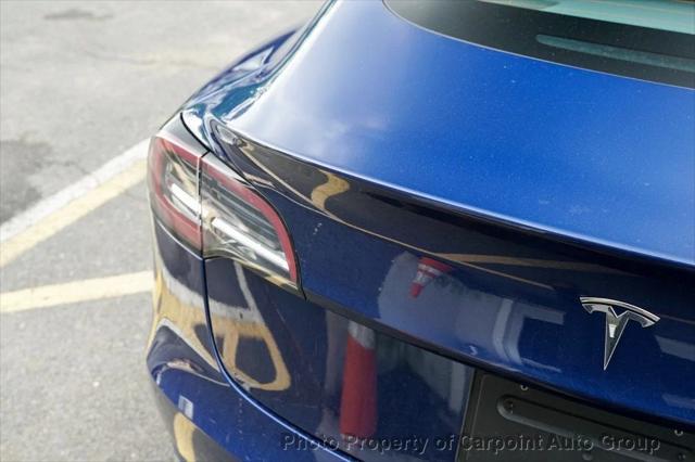 used 2022 Tesla Model 3 car, priced at $13,994