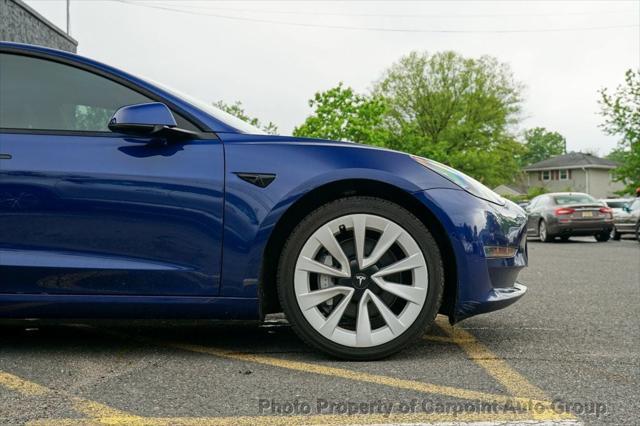 used 2022 Tesla Model 3 car, priced at $13,994