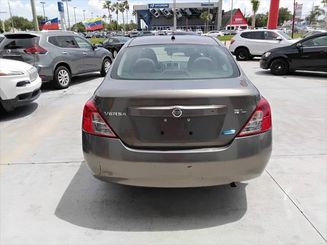 used 2012 Nissan Versa car, priced at $4,900