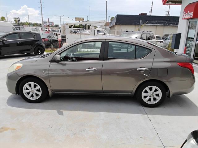 used 2012 Nissan Versa car, priced at $4,900