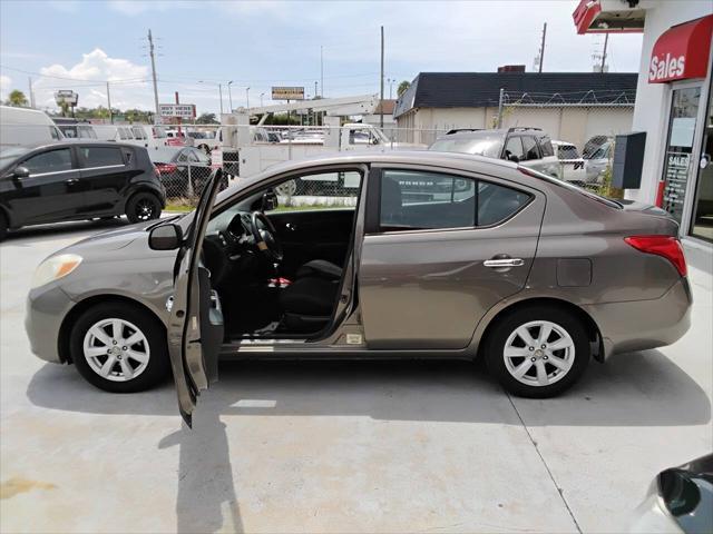 used 2012 Nissan Versa car, priced at $4,900