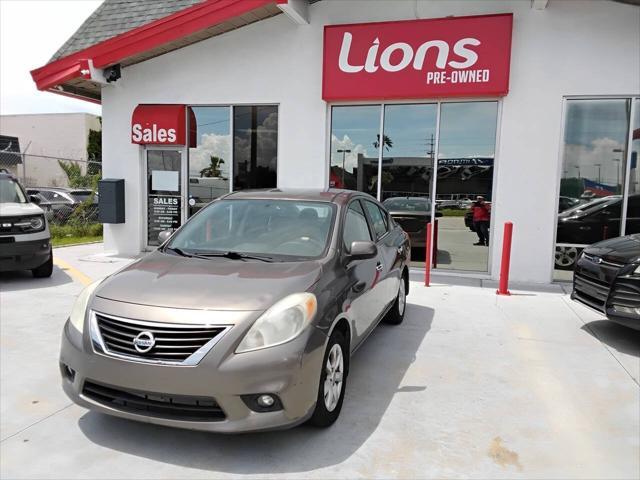 used 2012 Nissan Versa car, priced at $4,900