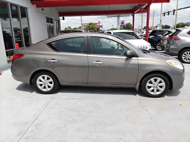 used 2012 Nissan Versa car, priced at $4,900