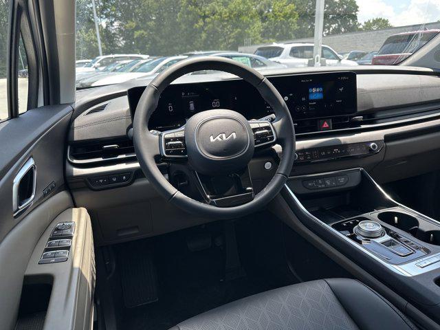 new 2025 Kia Carnival Hybrid car, priced at $44,923