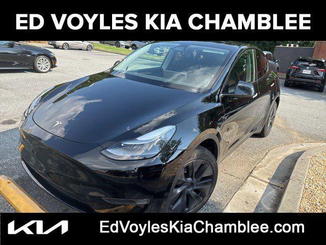 used 2025 Tesla Model Y car, priced at $33,923