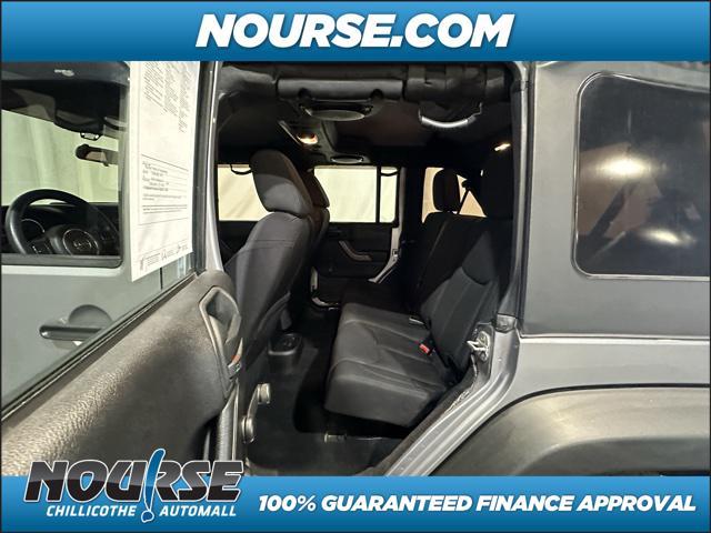 used 2013 Jeep Wrangler Unlimited car, priced at $18,721