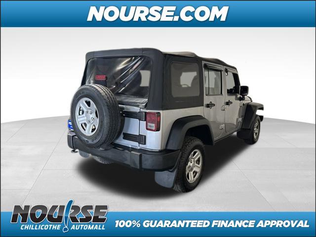 used 2013 Jeep Wrangler Unlimited car, priced at $18,721