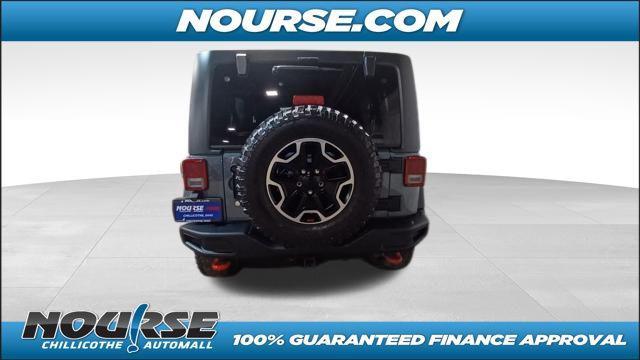 used 2014 Jeep Wrangler Unlimited car, priced at $22,866