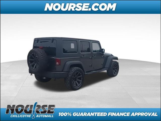 used 2014 Jeep Wrangler Unlimited car, priced at $18,957