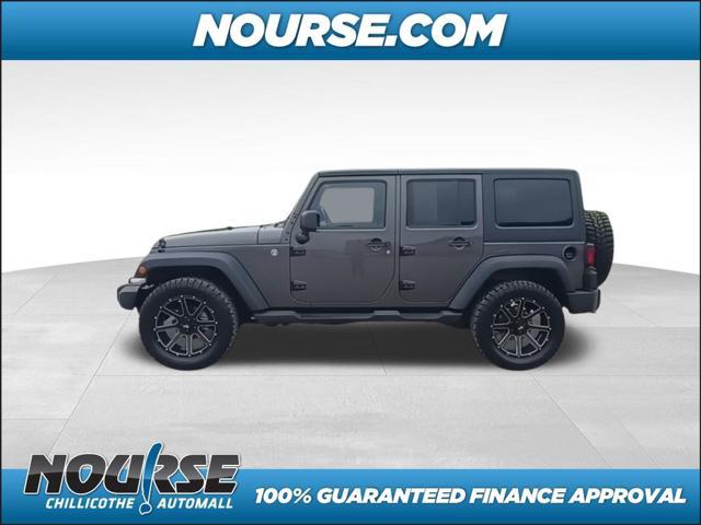used 2014 Jeep Wrangler Unlimited car, priced at $18,957