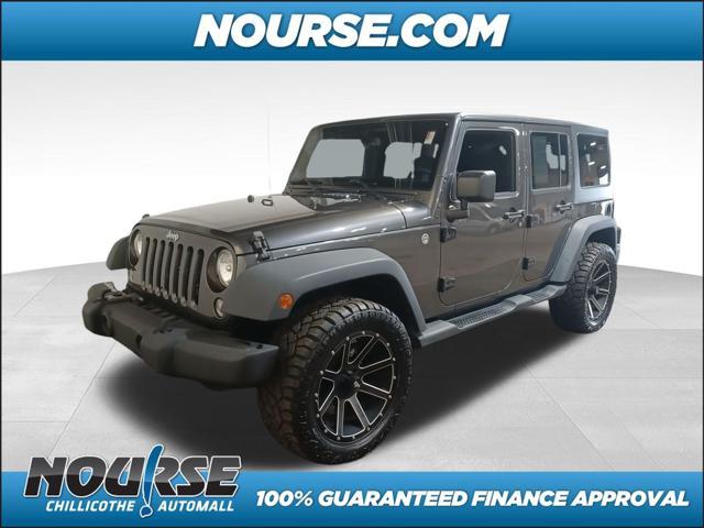 used 2014 Jeep Wrangler Unlimited car, priced at $18,957