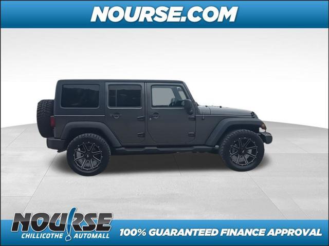 used 2014 Jeep Wrangler Unlimited car, priced at $18,957