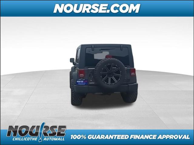 used 2014 Jeep Wrangler Unlimited car, priced at $18,957