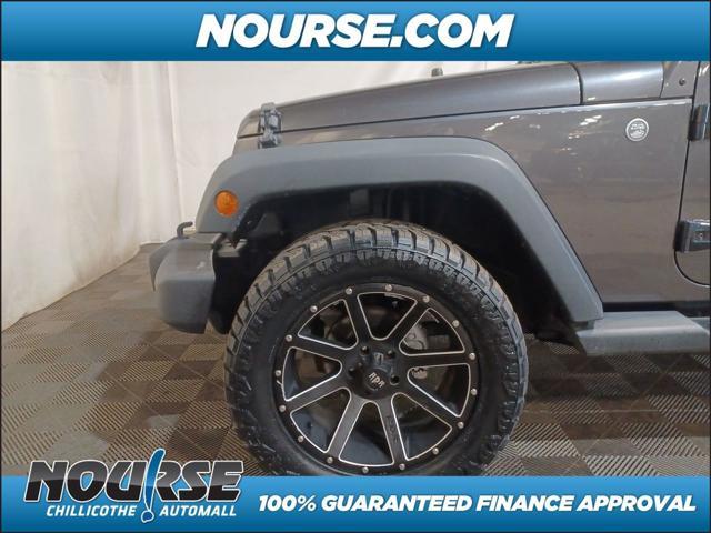 used 2014 Jeep Wrangler Unlimited car, priced at $18,957