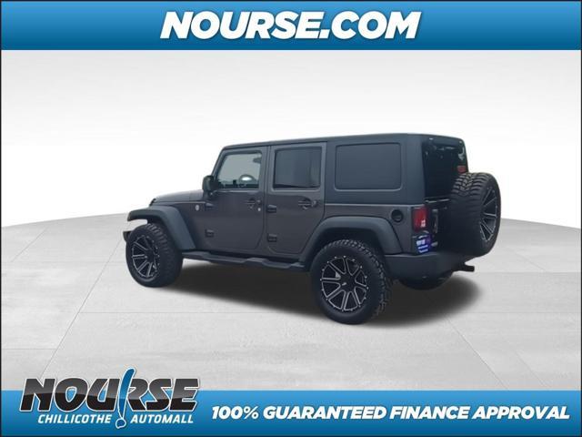 used 2014 Jeep Wrangler Unlimited car, priced at $18,957