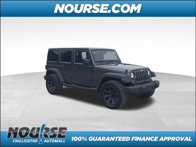 used 2014 Jeep Wrangler Unlimited car, priced at $18,957