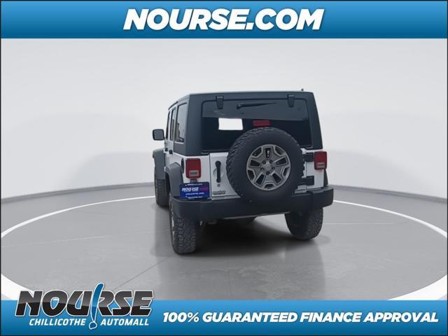 used 2018 Jeep Wrangler JK Unlimited car, priced at $26,414