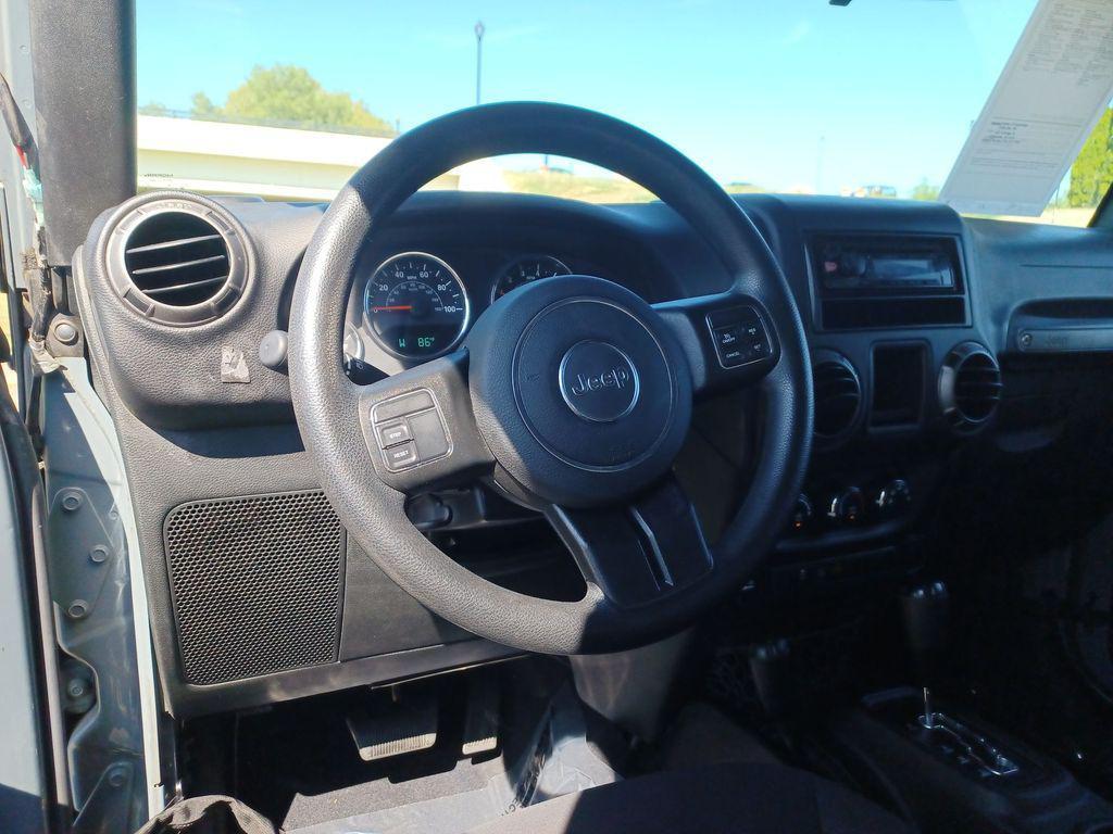 used 2015 Jeep Wrangler car, priced at $16,139