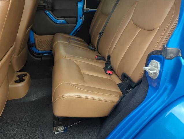 used 2015 Jeep Wrangler Unlimited car, priced at $23,676