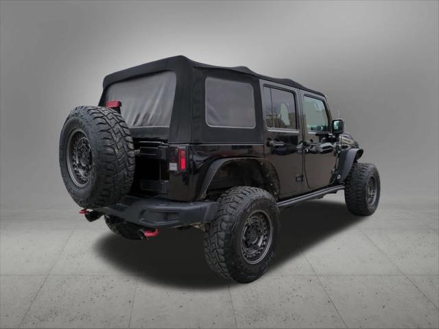 used 2016 Jeep Wrangler Unlimited car, priced at $24,844