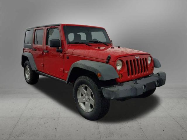 used 2011 Jeep Wrangler Unlimited car, priced at $18,778