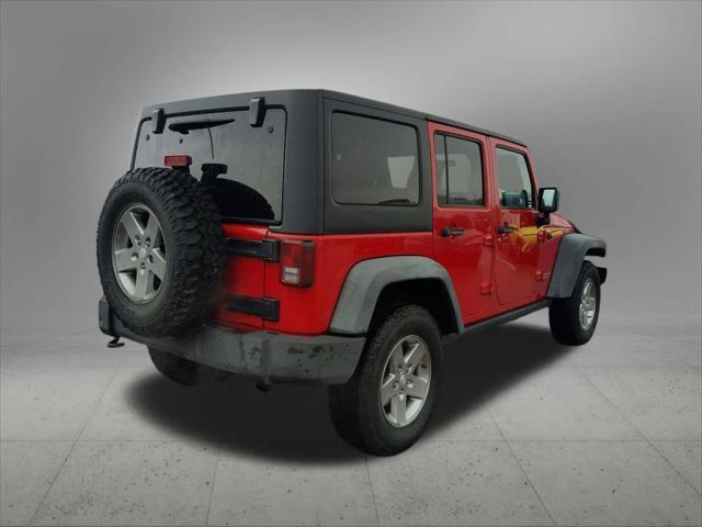 used 2011 Jeep Wrangler Unlimited car, priced at $18,778