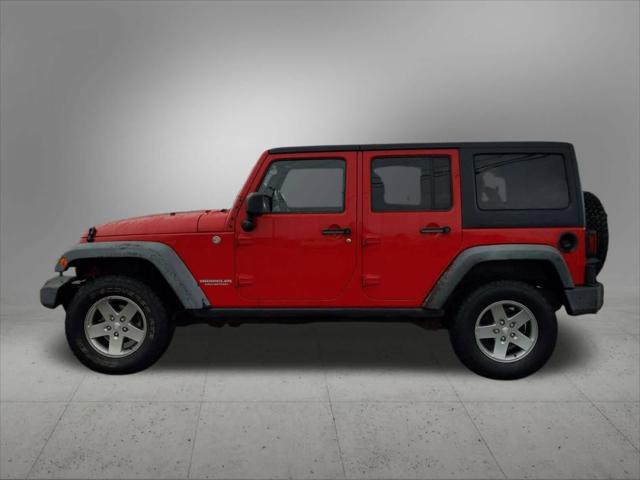 used 2011 Jeep Wrangler Unlimited car, priced at $18,778