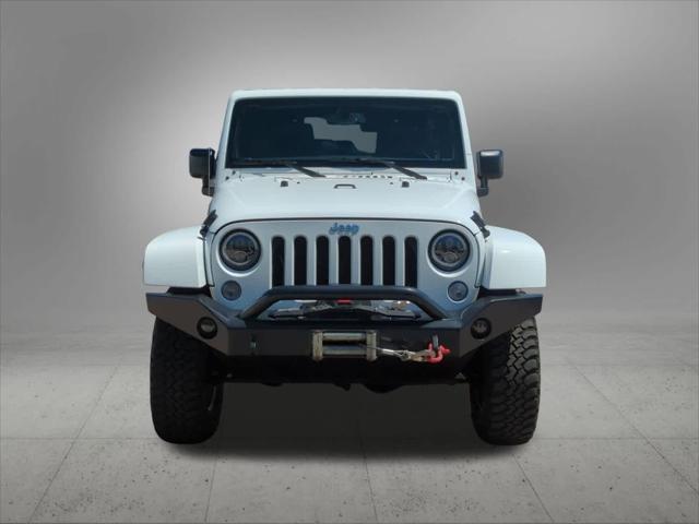 used 2015 Jeep Wrangler Unlimited car, priced at $24,058