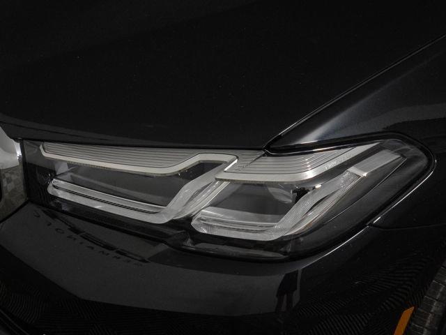 used 2023 BMW 530e car, priced at $36,710