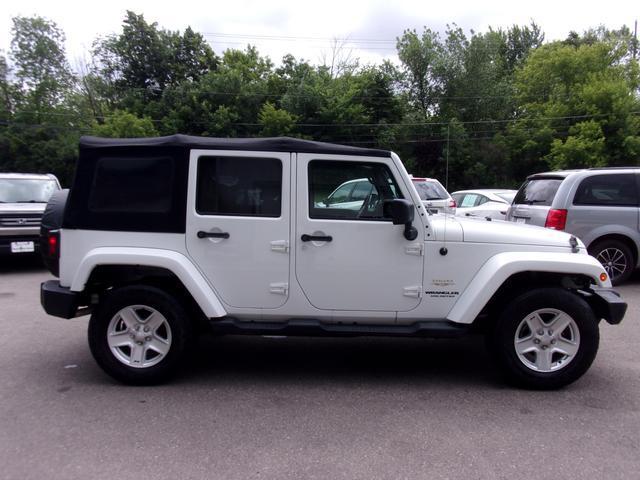 used 2014 Jeep Wrangler Unlimited car, priced at $18,995