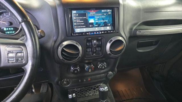 used 2016 Jeep Wrangler Unlimited car, priced at $18,525