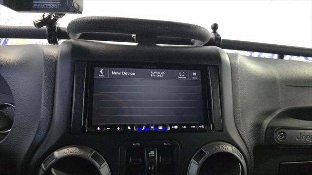 used 2016 Jeep Wrangler Unlimited car, priced at $18,525