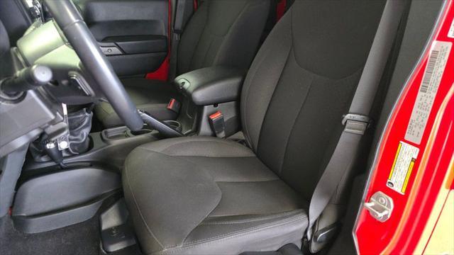 used 2018 Jeep Wrangler JK Unlimited car, priced at $23,957
