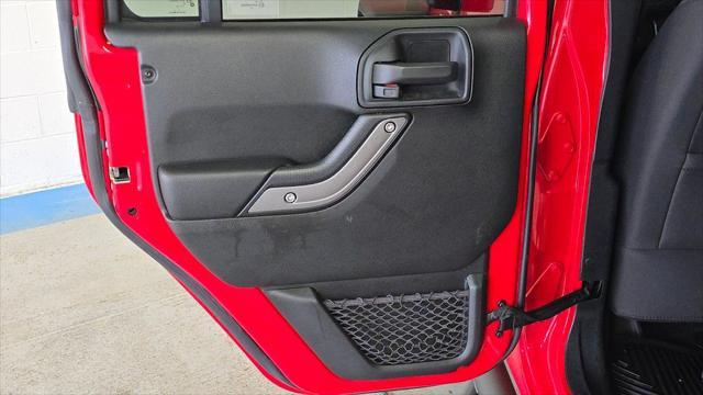 used 2018 Jeep Wrangler JK Unlimited car, priced at $23,957