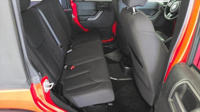 used 2018 Jeep Wrangler JK Unlimited car, priced at $23,957
