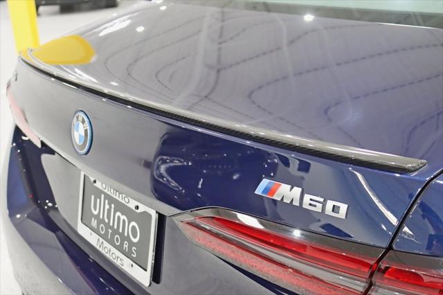 used 2024 BMW i5 car, priced at $64,672