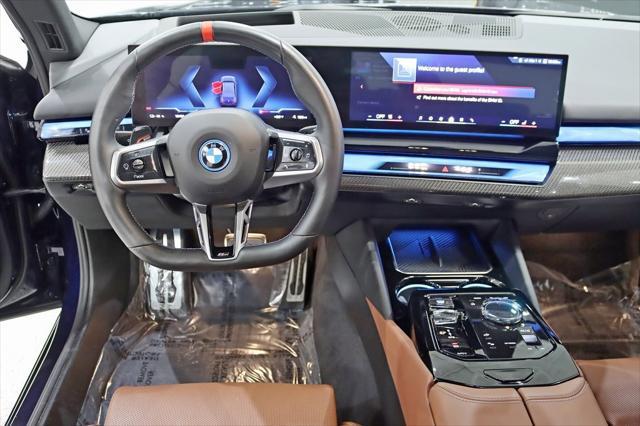 used 2024 BMW i5 car, priced at $64,672