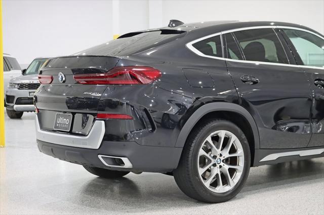 used 2022 BMW X6 car, priced at $57,499