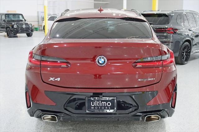 used 2022 BMW X4 car, priced at $38,990