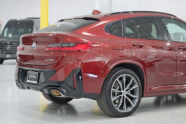 used 2022 BMW X4 car, priced at $38,990