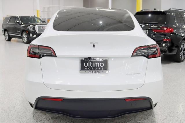 used 2025 Tesla Model Y car, priced at $41,900